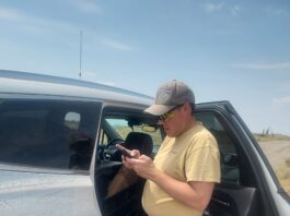 Mike researching where we need to go to get to the site.